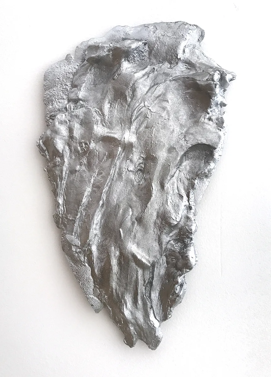 Shit 4 by Tanya Brodsky, Cast aluminum, 5 x 9 x ½ inches