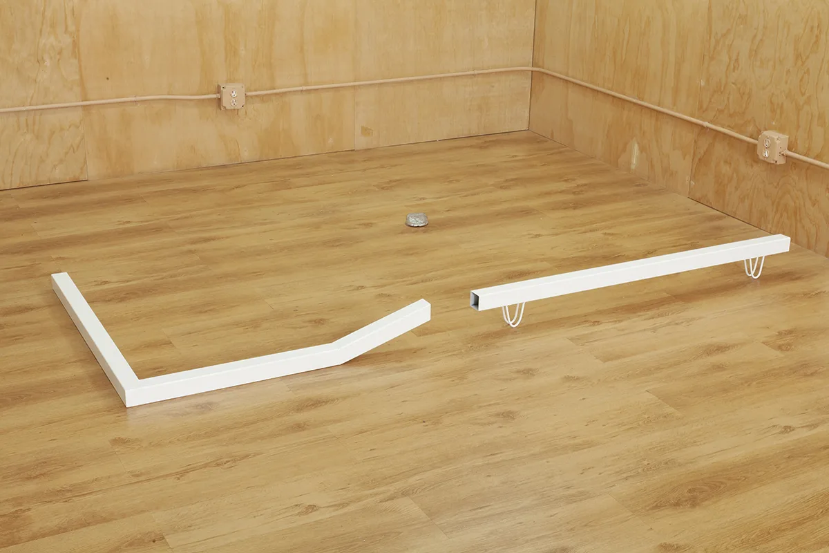 Various entry points 1 by Tanya Brodsky, Powder coated steel, 36 x 36 x 5 inches (left) and 48 ½ x 2 x 5 inches (right)