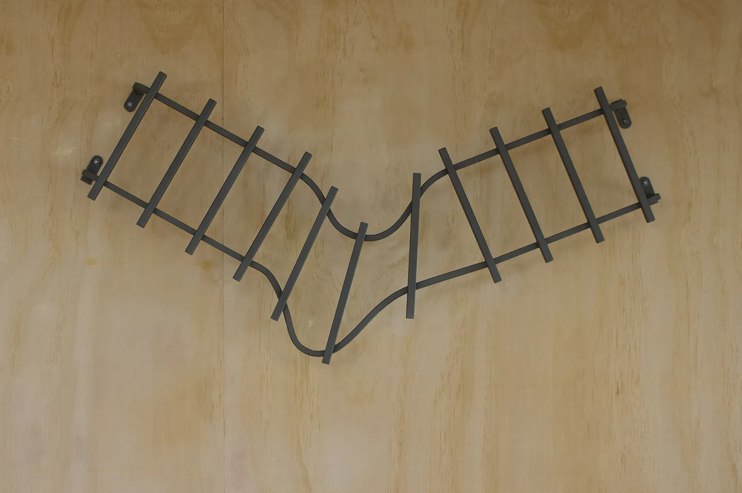 Gone Soft, 2017 by Tanya Brodsky, Found window security bars (modified), sandblasted, coated 23 x 48 x 4 inches