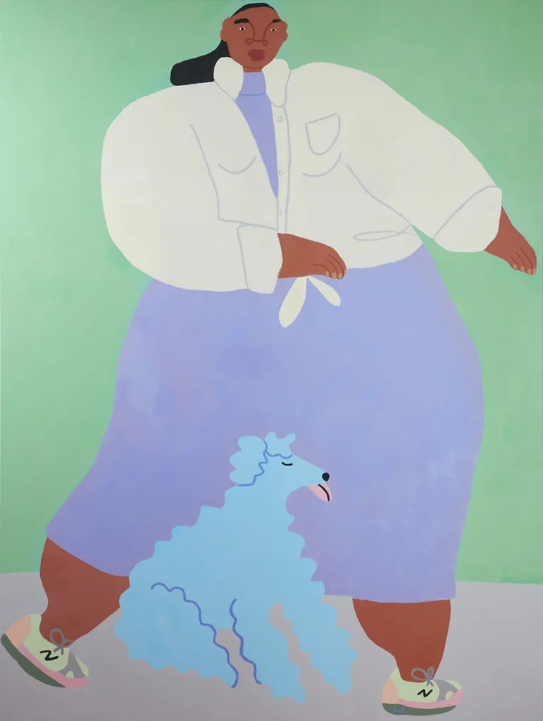 A Lady is walking with her dog