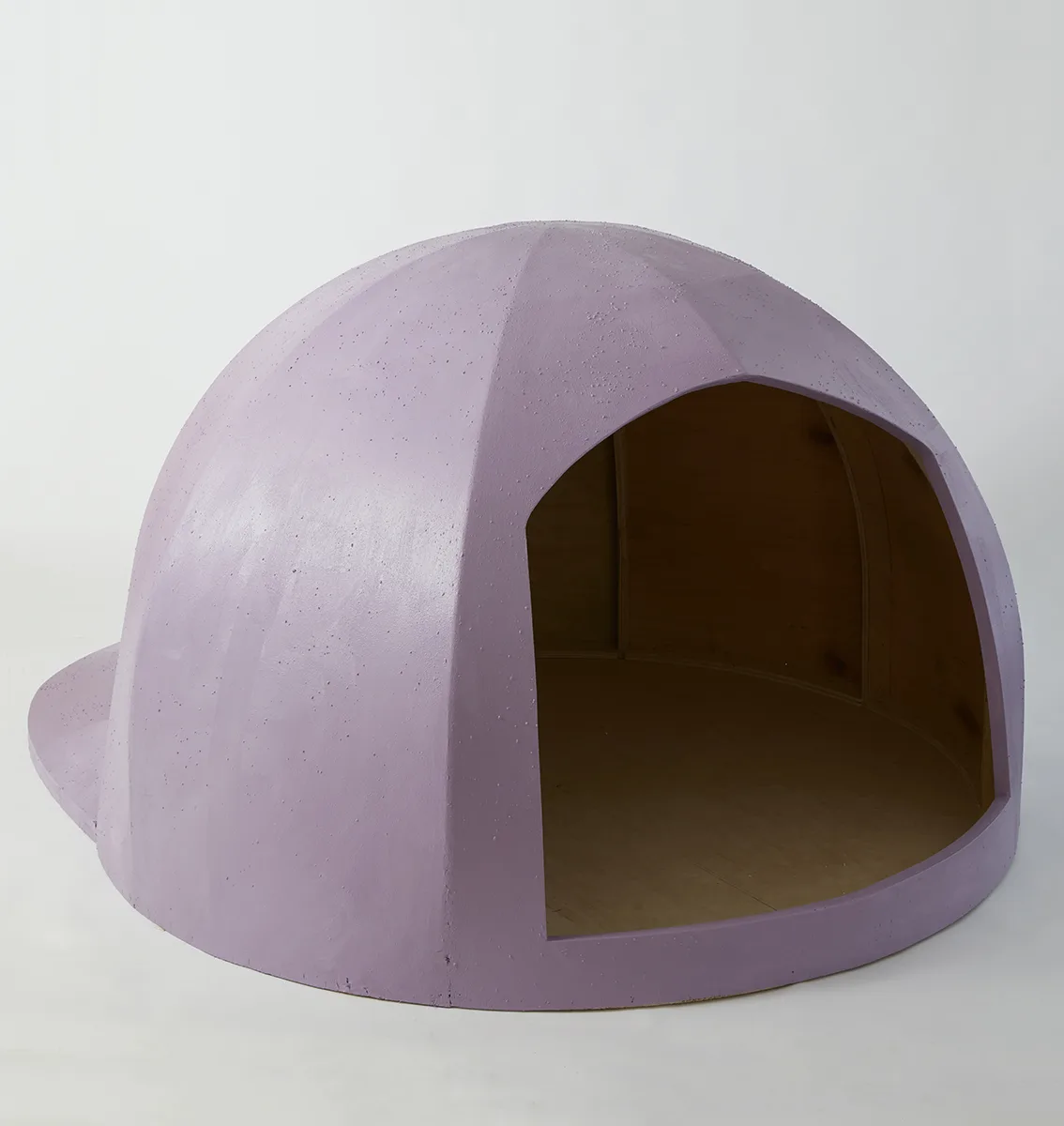 A detail image of a sculpture that is shaped as a big baseball hat.