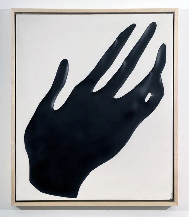 Handless (Black) 2016 by Erin Morrison Enamel and wax on hydrocal, maple frame 23 ⅝ x 27 ⅞”