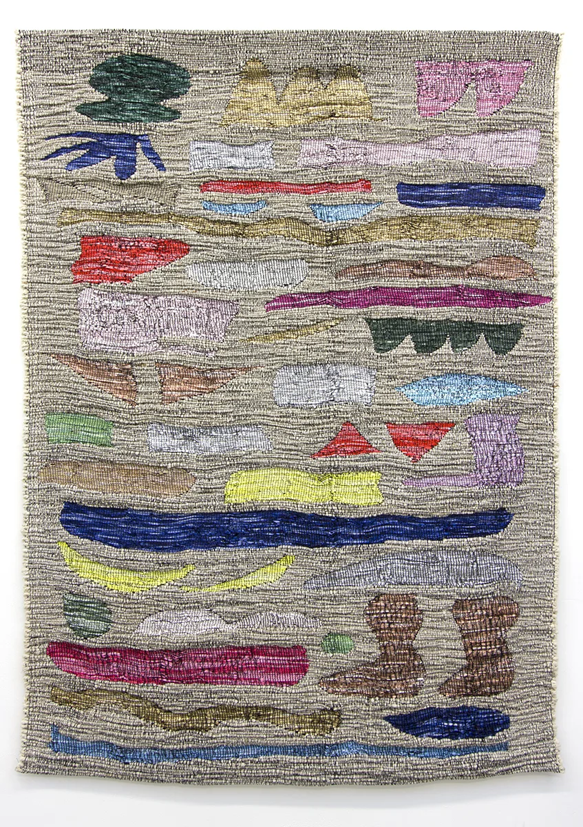A textile art that shows Modernist Shapes and Figures