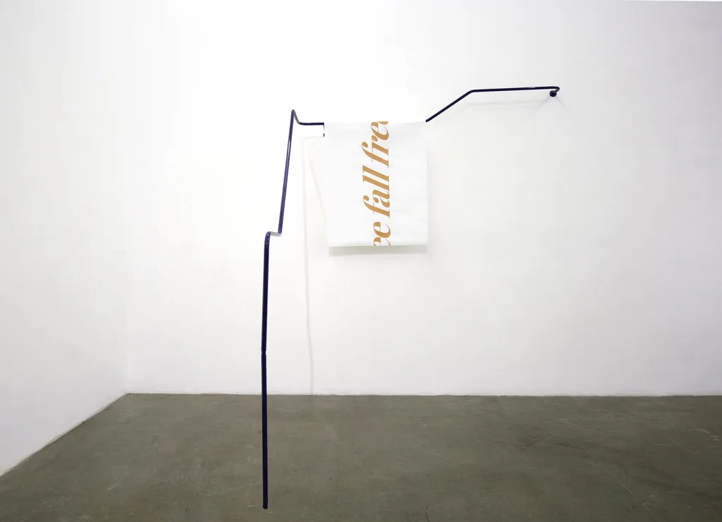 An installation that shows a coated steel. Each end was supported by the wall and floor