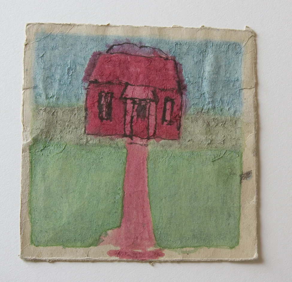 Work on paper that shows a red house and a walkway