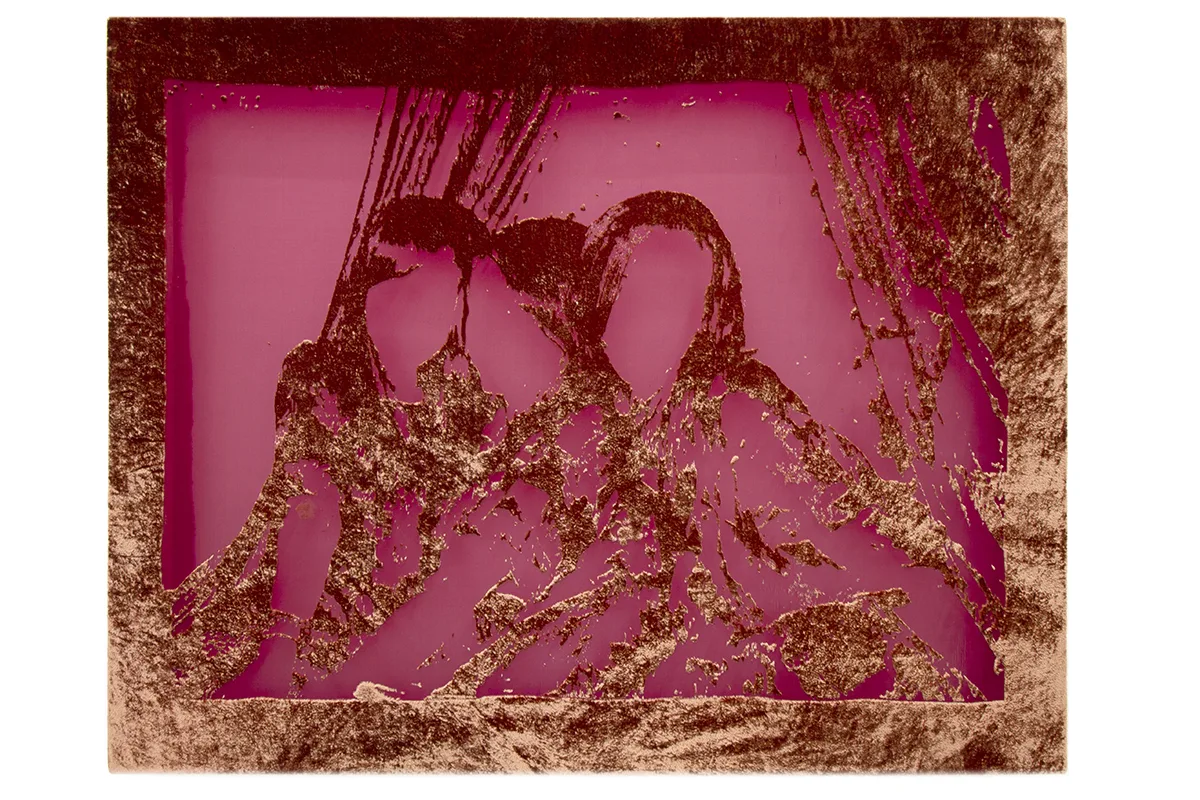 Three young women holding each other close