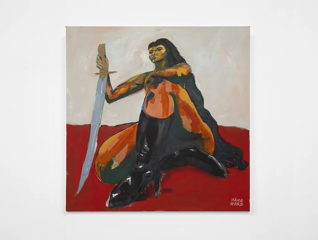 A medium-dark-skinned female with waist-length hair holds a sword