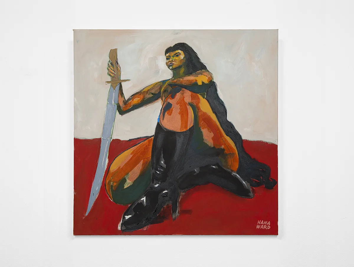 A medium-dark-skinned female with waist-length hair holds a sword