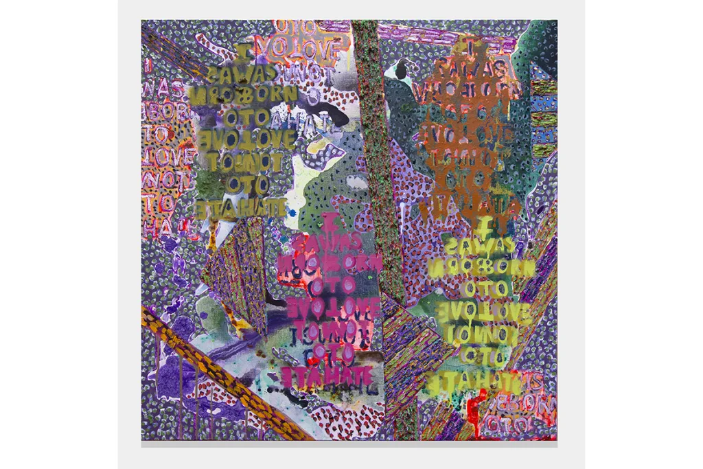 A painting with multiple colors that spell out “I was born to love not to hate” in a mirror format