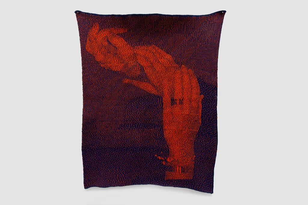 A maroon tapestry that shows three human hands