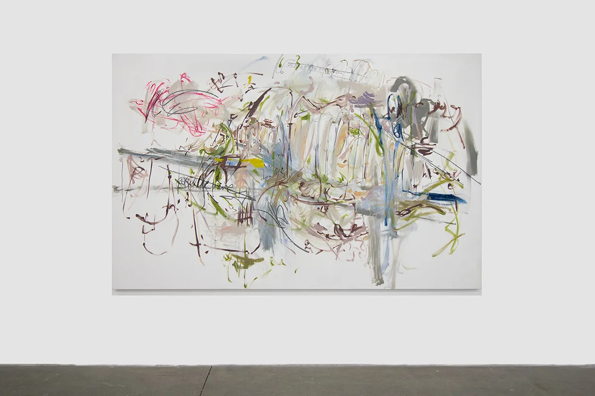 An abstract painting that consists of bright and vivid, and earth-tone paints that were smeared on the white canvas