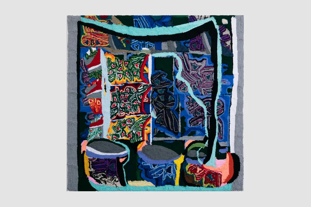 A large-scale painting made entirely of brightly-colored yarn that feature abstraction. It depicts a digital doodling