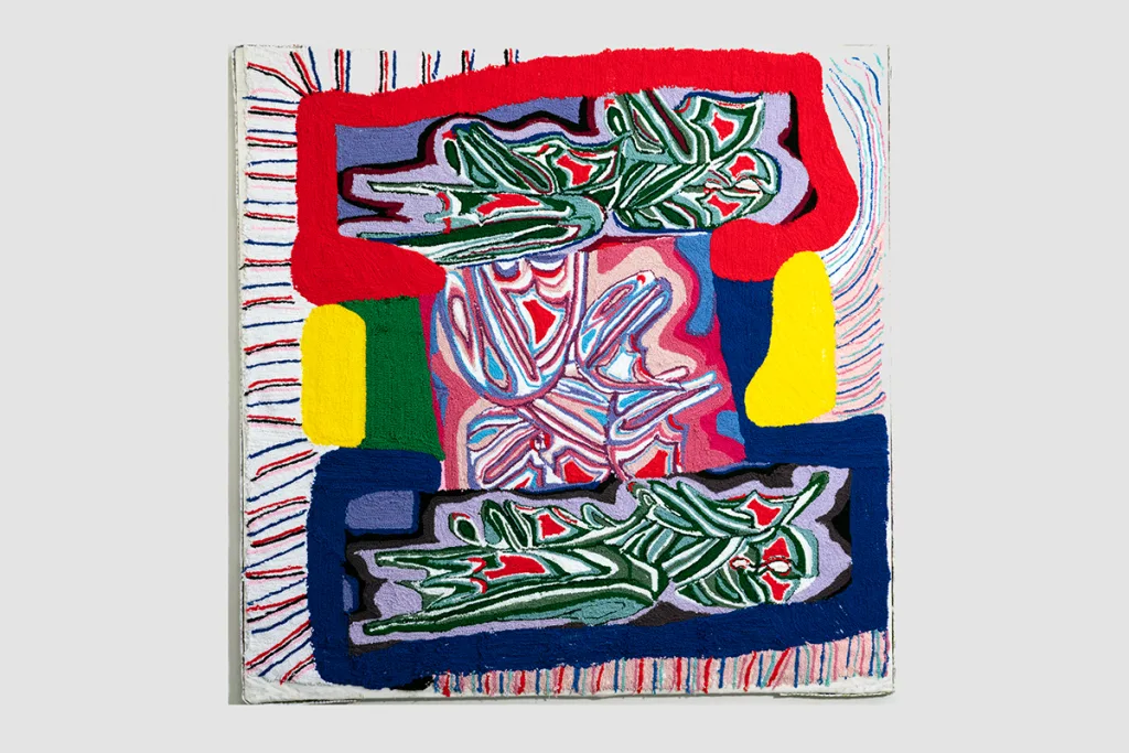A large-scale painting made entirely of brightly-colored yarn that feature abstraction. It depicts a digital doodling