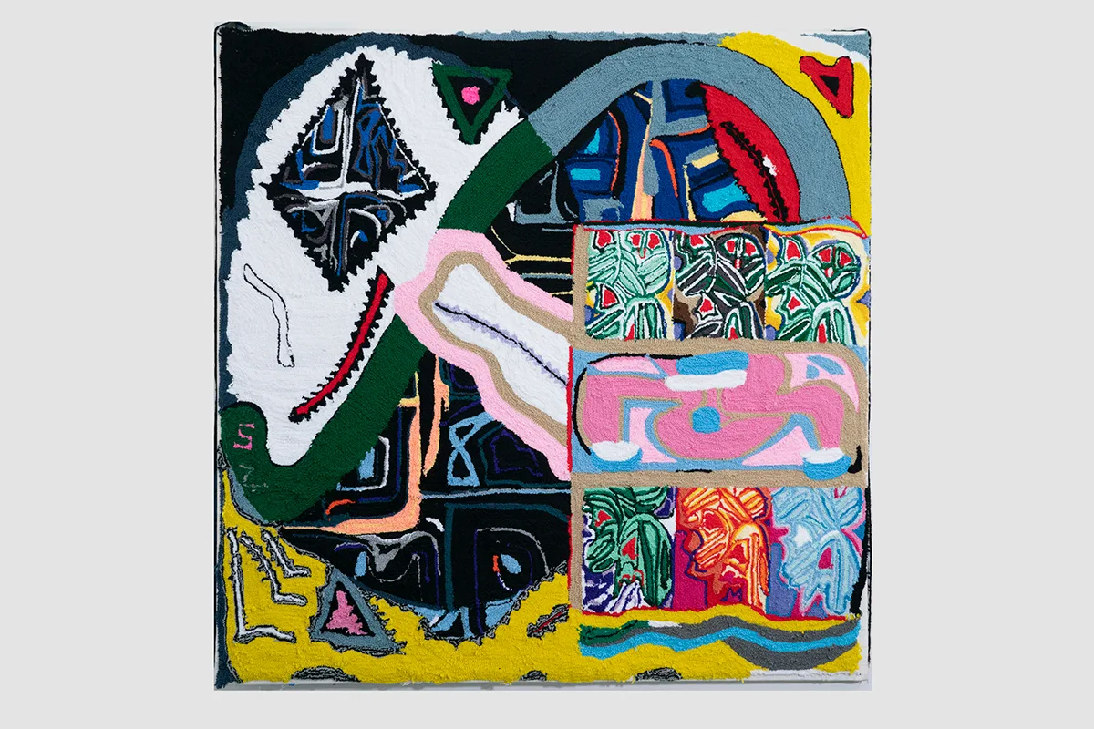 A large-scale painting made entirely of brightly-colored yarn that feature abstraction. It depicts a digital doodling