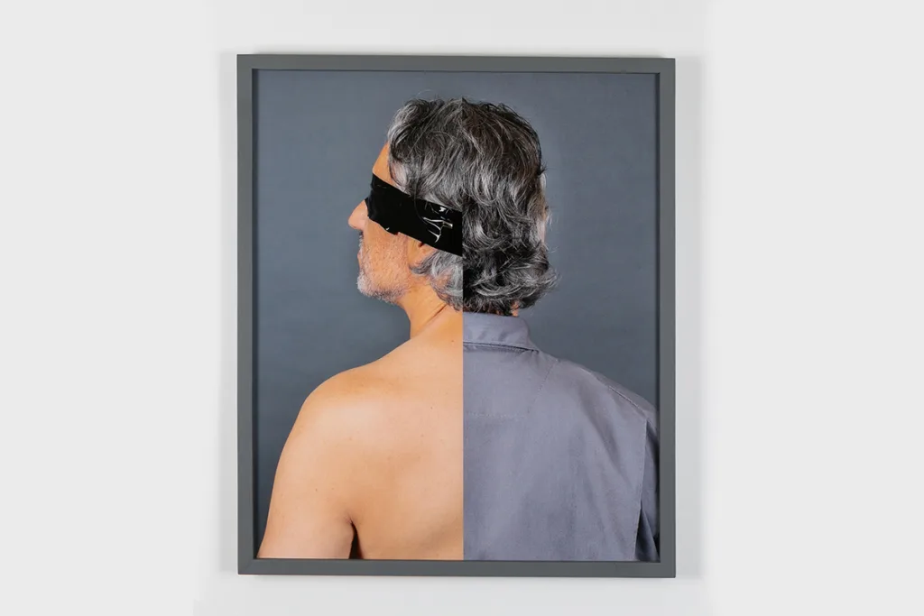 A photo of a blindfolded man