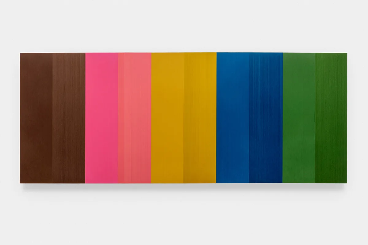 A hanging-wall sculpture by artist Brian Wills using multi-colored, Oil and single strand thread on oak