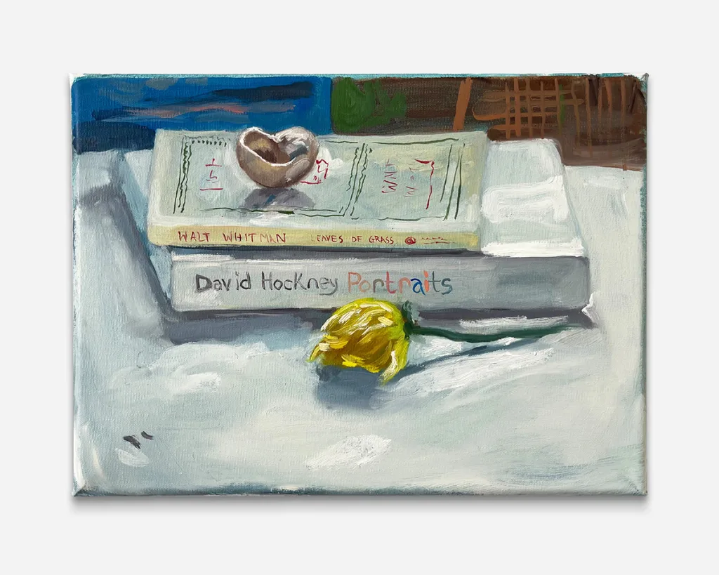 a painting of two books with a wilted yellow flower in front and an open shell on top