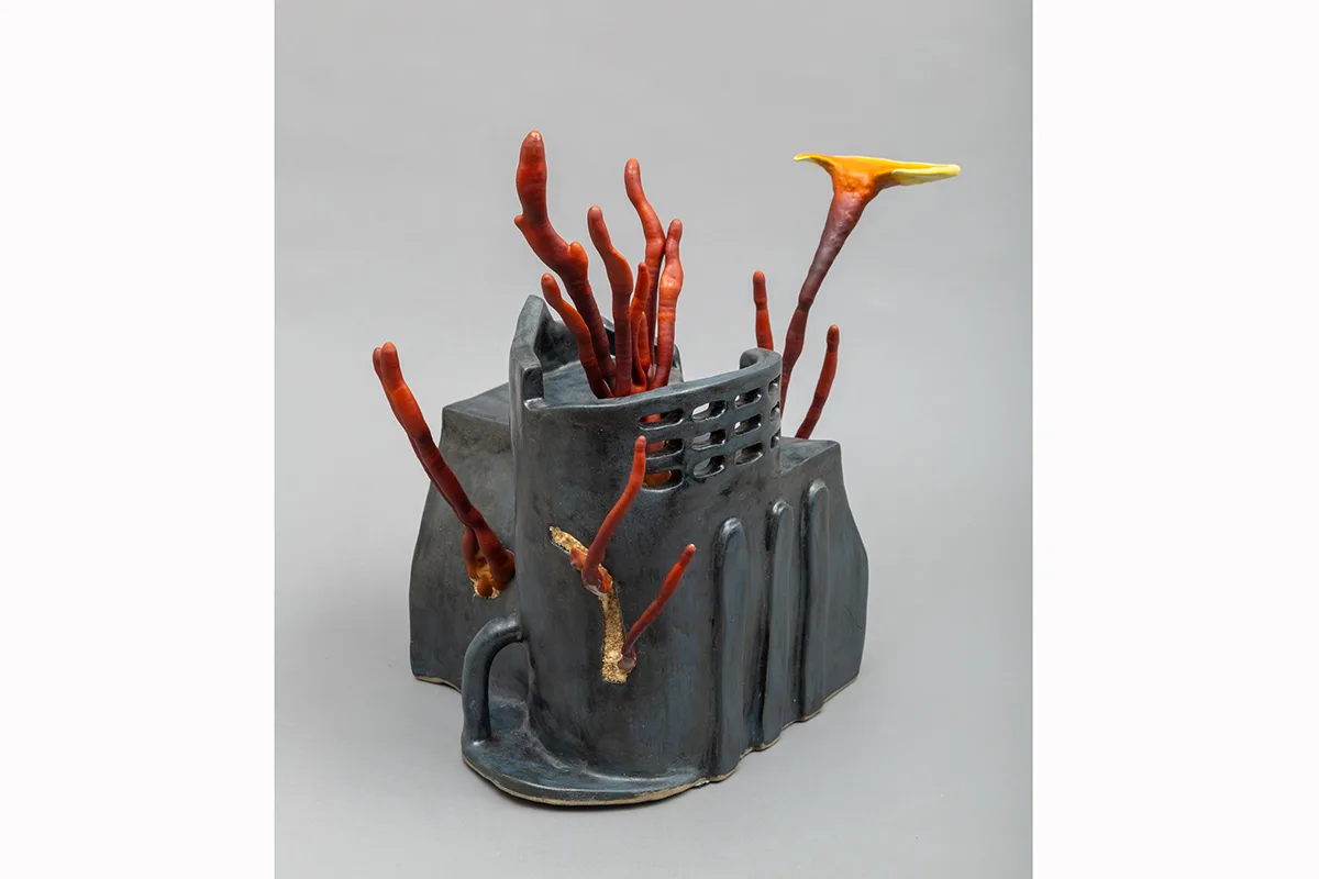 Image of a Sam Shoemaker piece featuring mushrooms sprouting out of a ceramic vessel