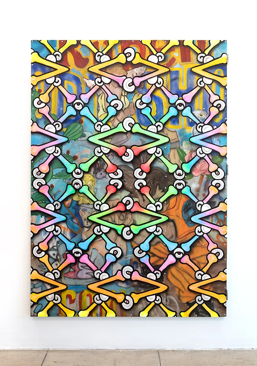 Image of an Ozzie Juarez piece, a brightly painted metal gate