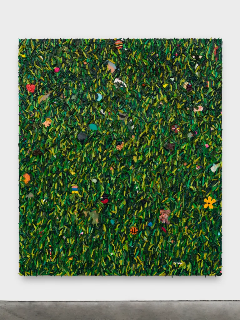 Layers of paint in various shades of green are applied to create a three-dimensional affect.