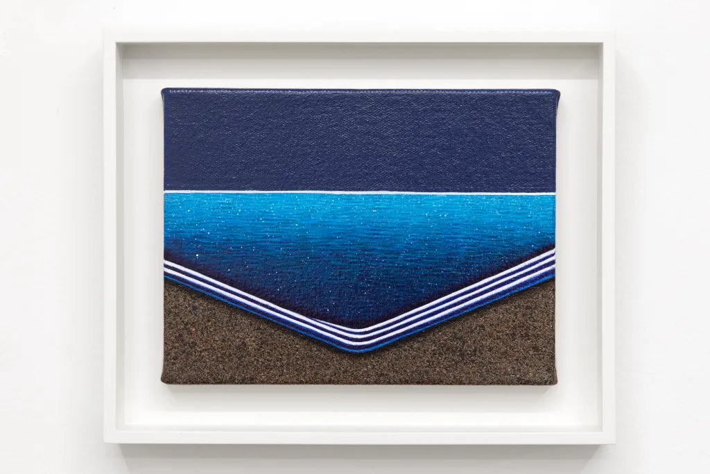 A painting of a body of water, a dark blue sky, and dark colored sand. The bottom half is made up of sand and waves while the top half is the horizon line and sky above. The body of water is shaped to have its corner closest to us