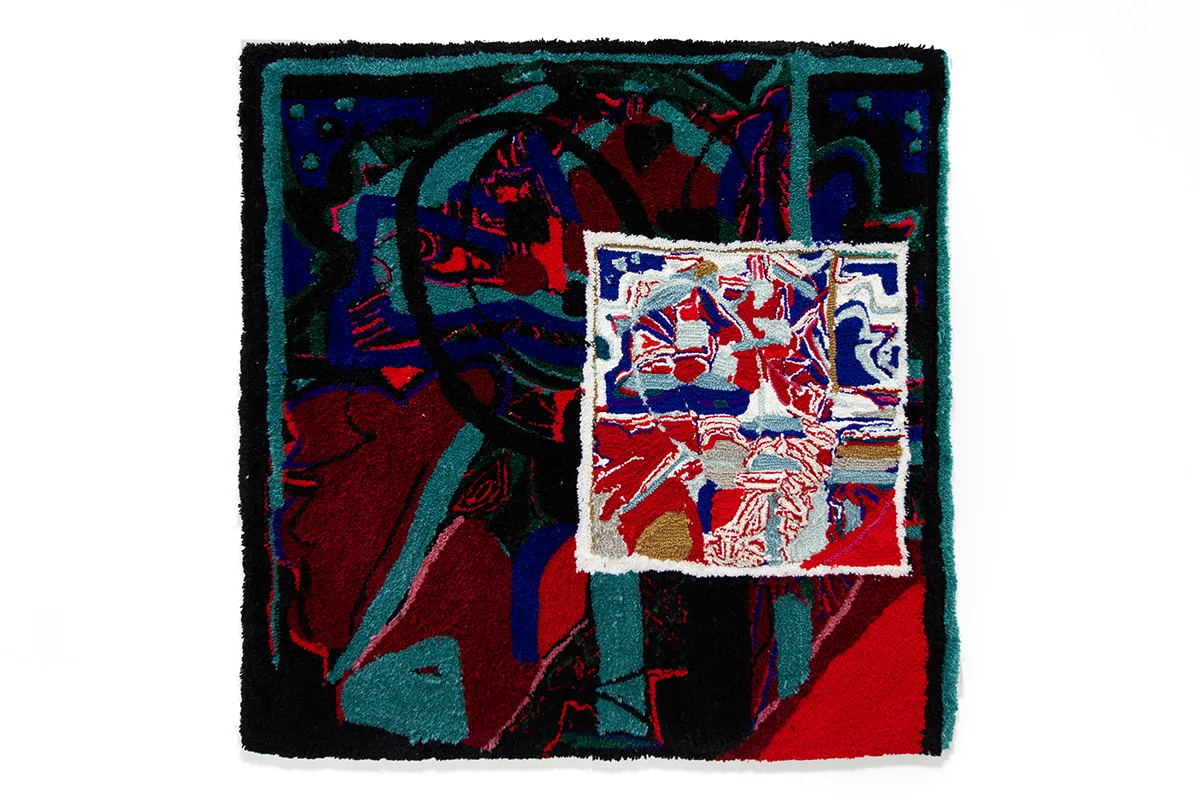 A tufted image of various blue, red, black, white, and aqua shapes arranged atop eachother.