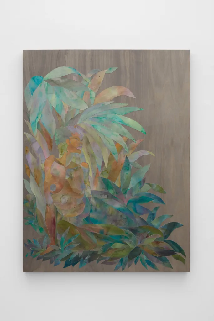 Ink on cut paper arranged to form a figure reclining sideways in a bed of foliage. Mounted on a wood panel with a dark gray stain