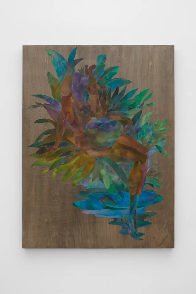 Ink on cut paper arranged to form a figure sitting upright with their back towards the viewer in a bed of foliage. Mounted on a wood panel with a dark gray stain