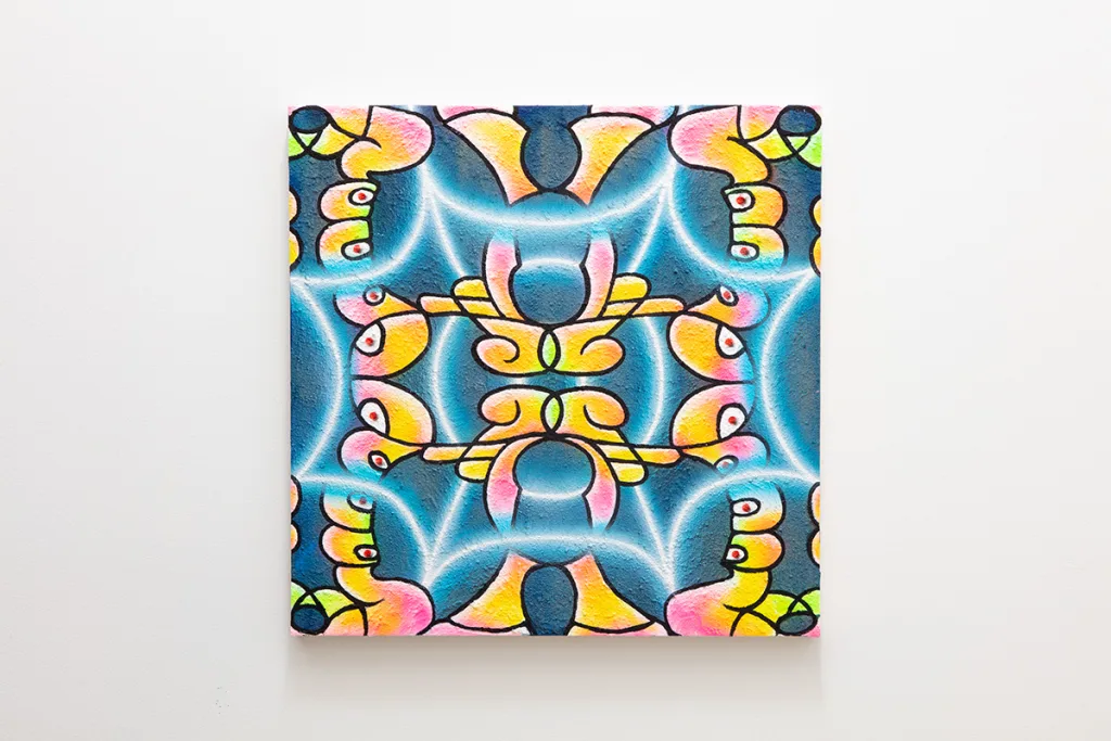 A graphic neon pattern on a dark blue background