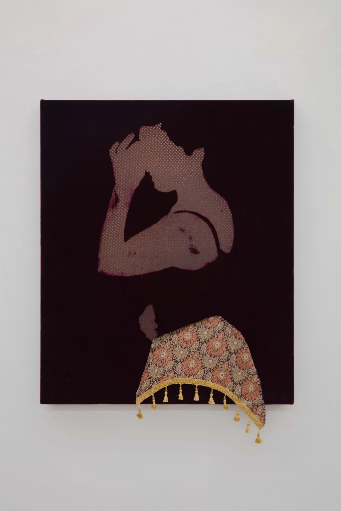 A woman touching her face and belly