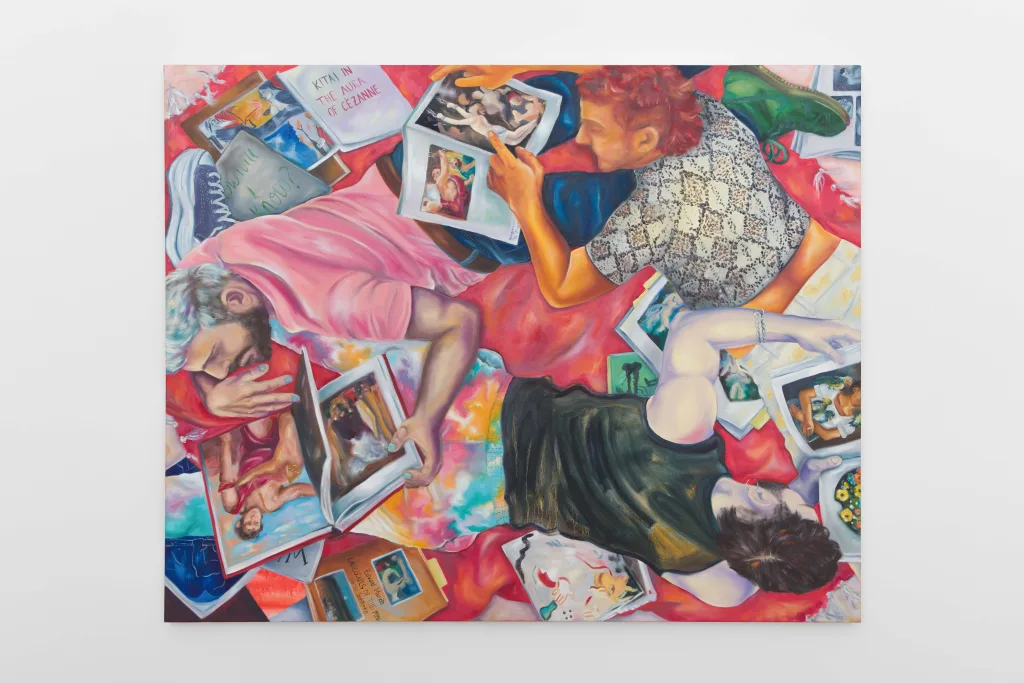 Three men lying on a bed, engrossed in books, while the pages depict human figures.