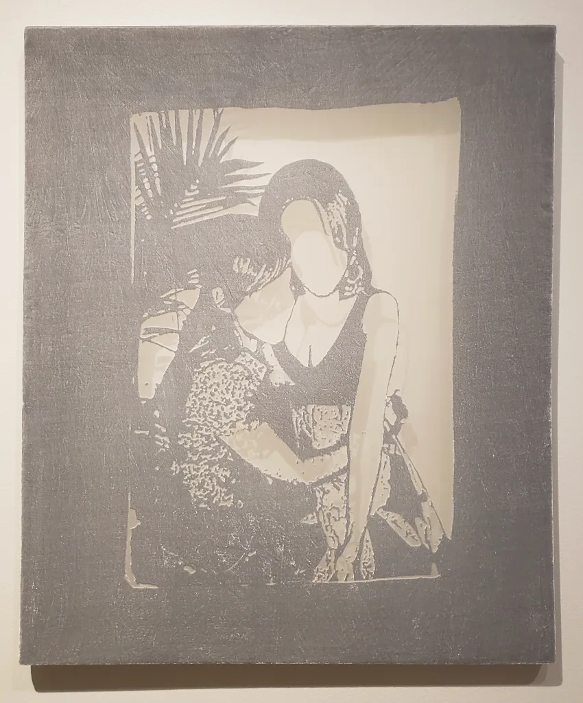 Two ladies holding each other close