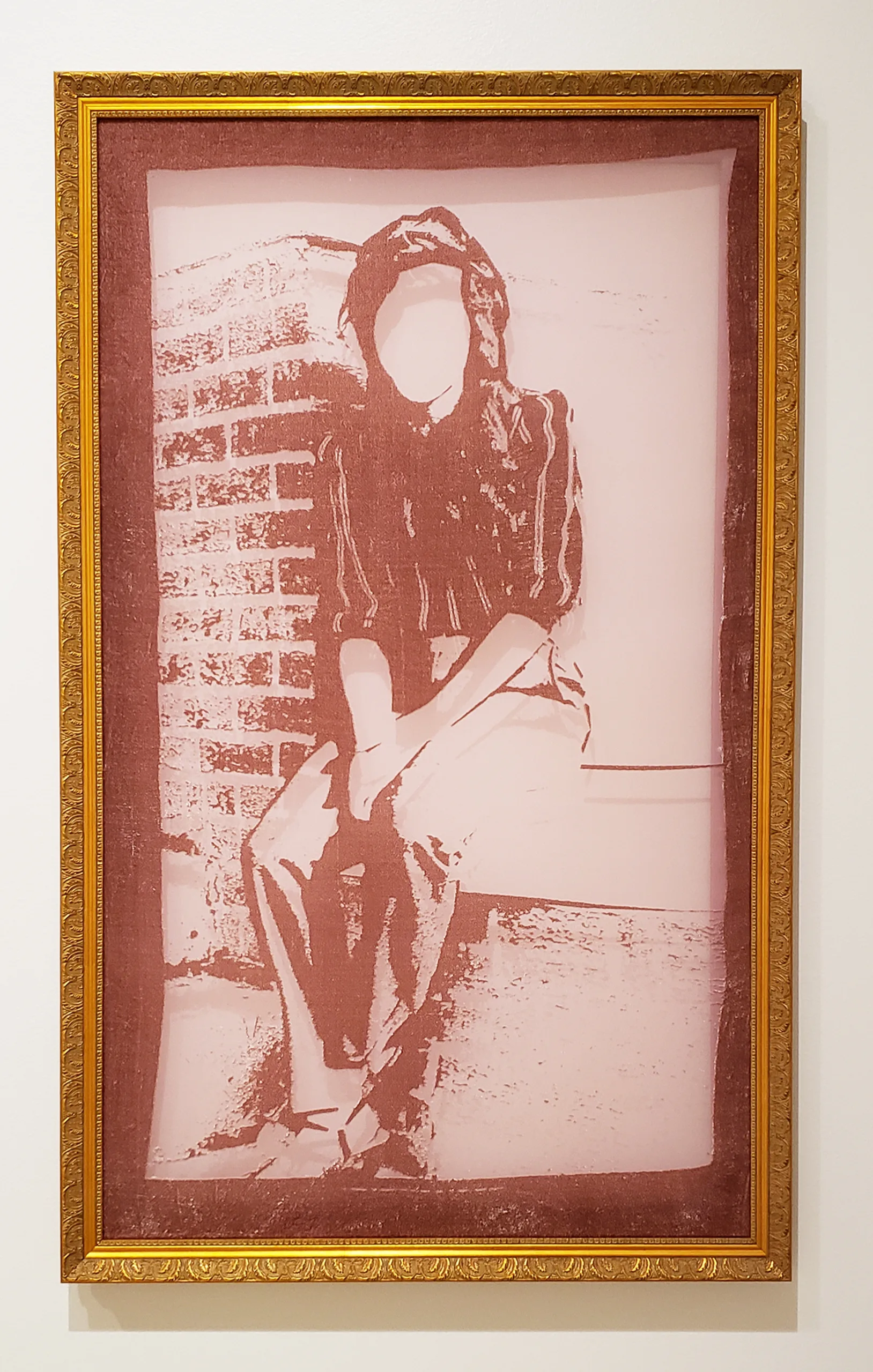 A lady is sitting on the porch