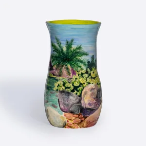 A pond landscape is painted on a ceramic