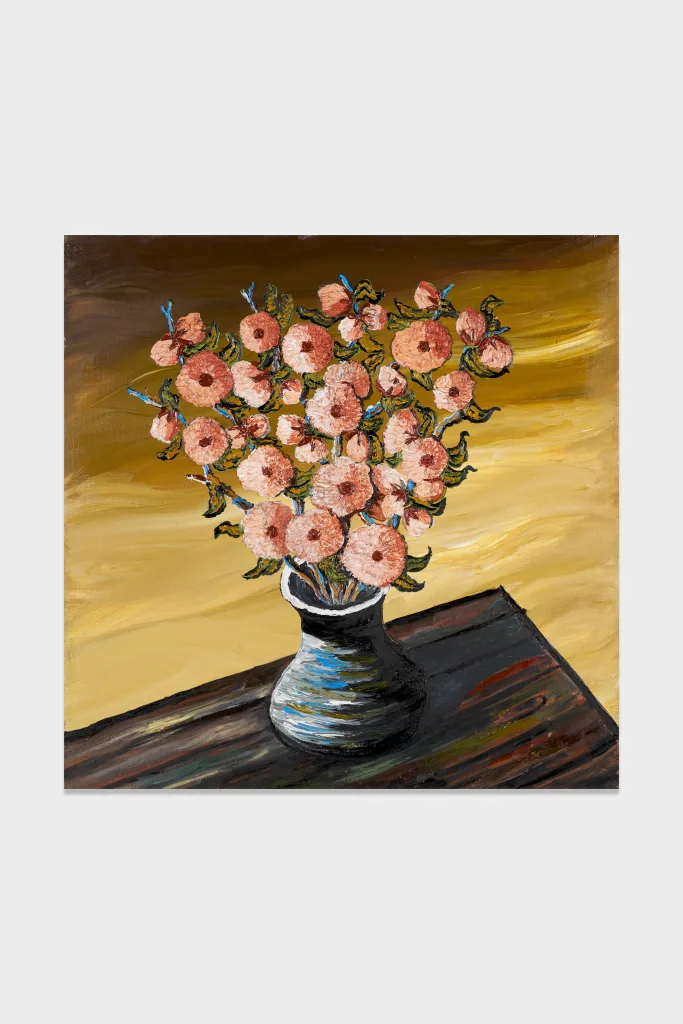 A high impasto painting of a pot of peach colored flowers sitting on the corner of a dark wood table. The background is made up of thick yellow and brown paint smears.