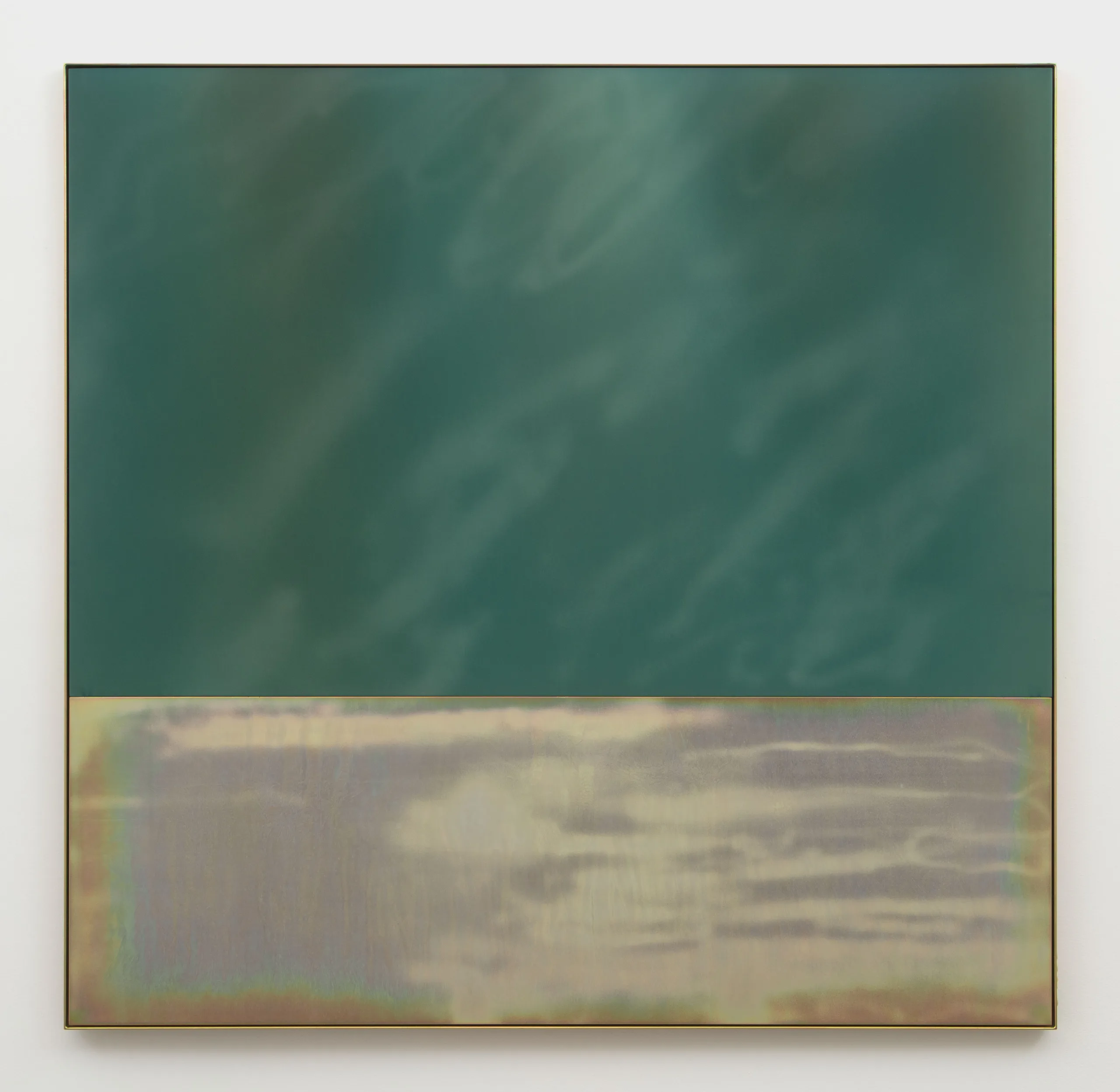 A metallic green plate of anodized aluminum with diagonal and very light sandblasting marks sits above a plate of yellow zinc plated steel within a frame of the same steel. The diagonal sandblasting marks on the top plate are light and airy and reflect ambient light. The bottom plate also has light horizontal sandblasting marks which reflect ambient light.
