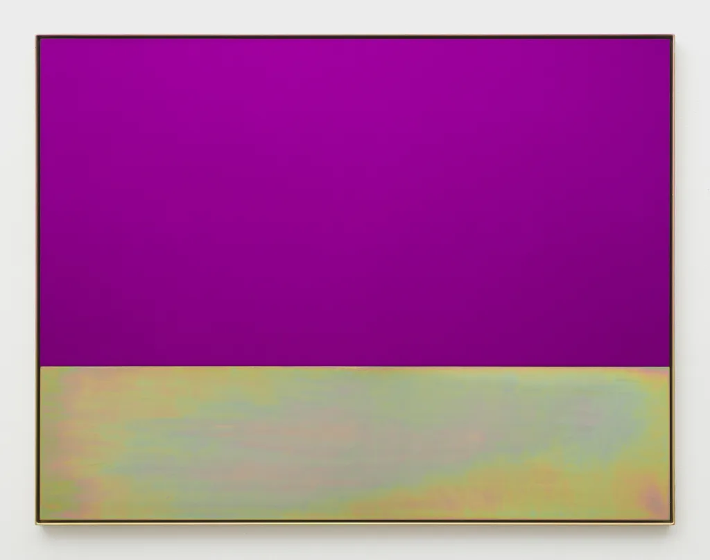 A bright purple plate of anodized aluminum sits within a yellow zinc plated steel frame. Nestled within the same frame is a plate of yellow zinc plated steel with slight horizontal sandblasting.